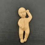 Ξυλόγλυπτο Μωρό 10εκ. Χ 4,5εκ.