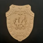 Ξυλόγλυπτη Ασπίδα 25εκ. Χ 19εκ.