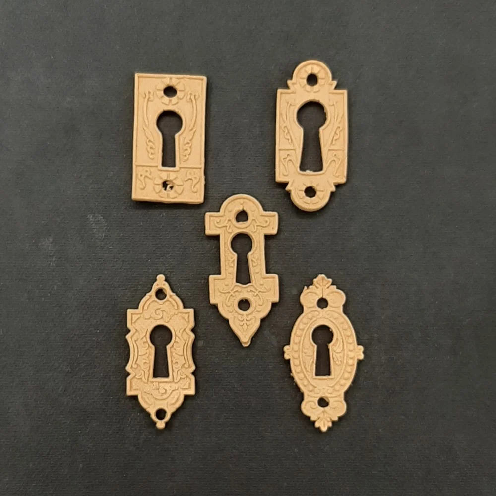 Ξυλόγλυπτο Διακοσμητικό Σετ 5 τεμ. Κλειδαρότρυπες  4,5εκΧ2,8εκ.